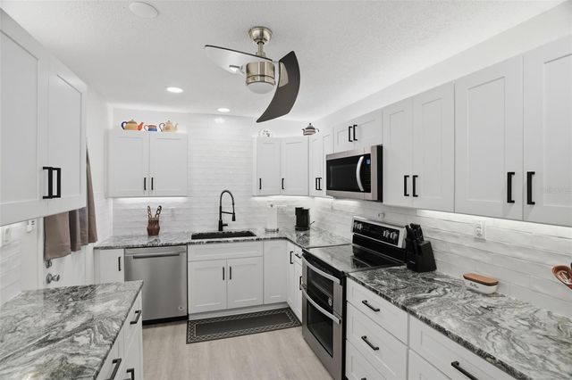 1127 KING ARTHUR COURT 316, Dunedin, FL 34698