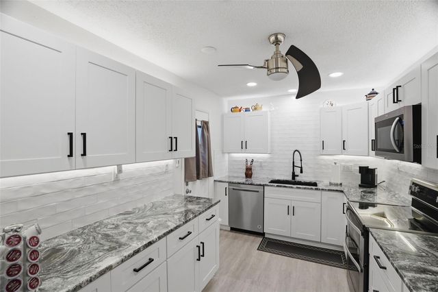 1127 KING ARTHUR COURT 316, Dunedin, FL 34698