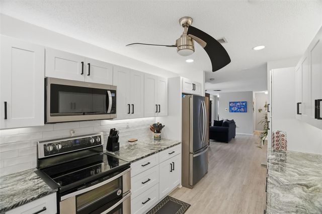 1127 KING ARTHUR COURT 316, Dunedin, FL 34698