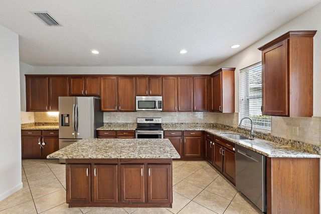 5903 SE Crooked Oak Avenue, Hobe Sound, FL 33455