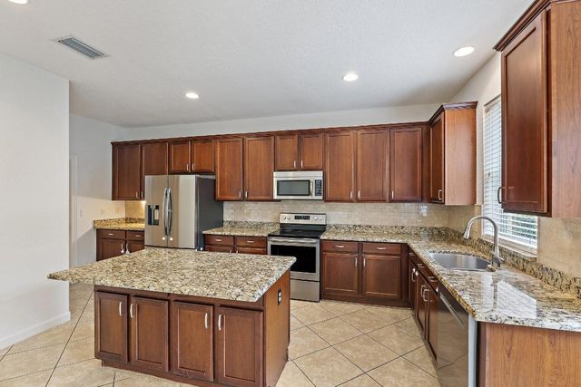 5903 SE Crooked Oak Avenue, Hobe Sound, FL 33455