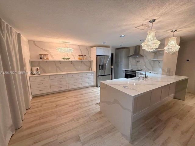 303 Bridgeton Road, Weston, FL 33326