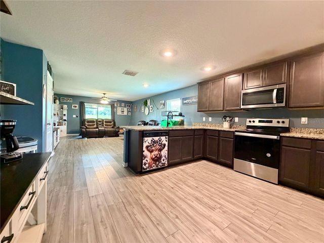 11991 CALLICARPA LANE, Leesburg, FL 34788