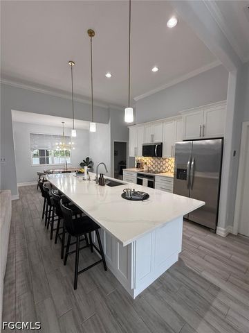 1418 NE 11th TER, Cape Coral, FL 33909