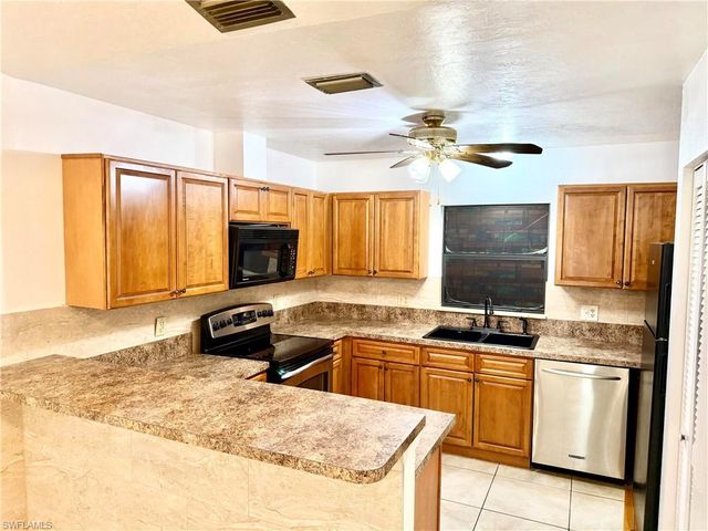 1891 51st ST SW, Naples, FL 34116