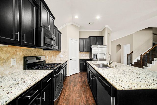 22107 Rustling Springs Drive, Spring, TX 77389