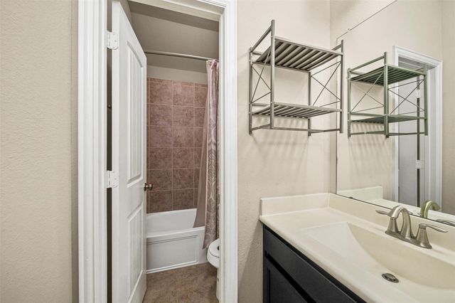 22107 Rustling Springs Drive, Spring, TX 77389