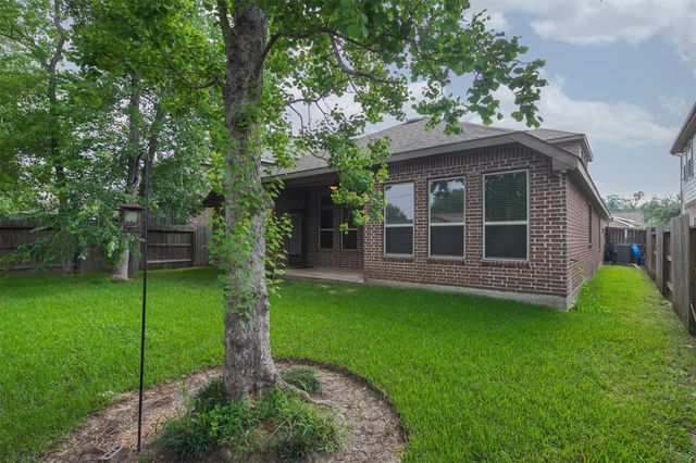 22107 Rustling Springs Drive, Spring, TX 77389