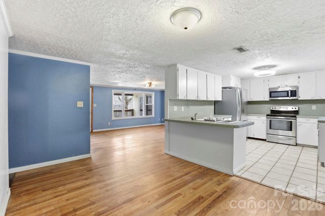 180 Whispering Pines Drive, Pisgah Forest, NC 28768