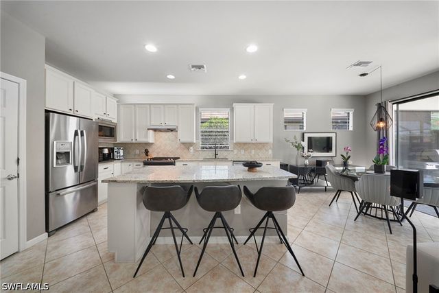 7052 Live Oak DR, Naples, FL 34114