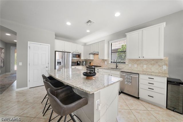 7052 Live Oak DR, Naples, FL 34114