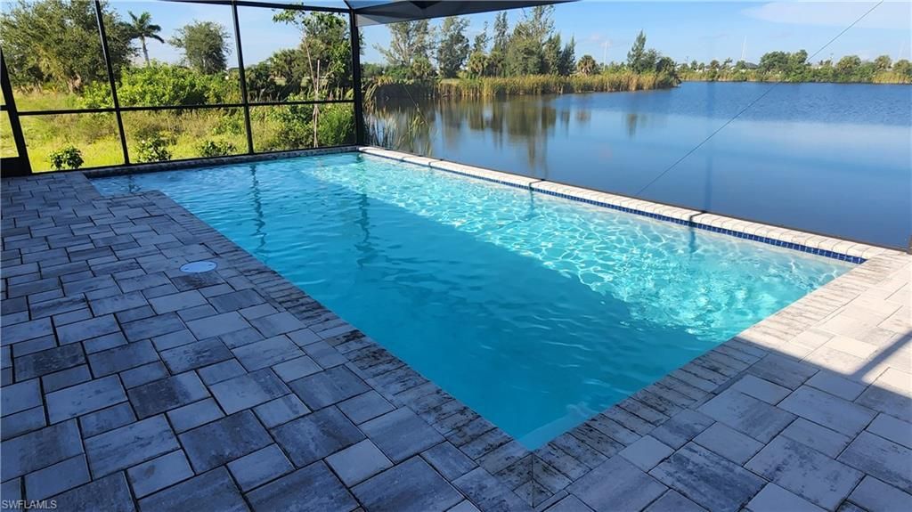 702 NW 30th PL, CAPE CORAL, FL 33993 — photo 4