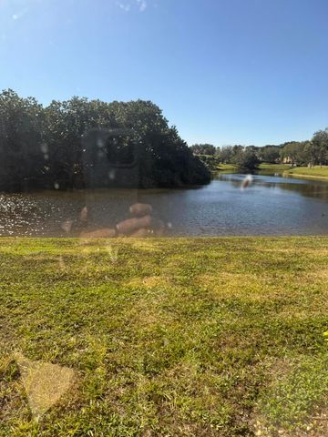 5250 Woodland Lakes Drive 130, Palm Beach Gardens, FL 33418