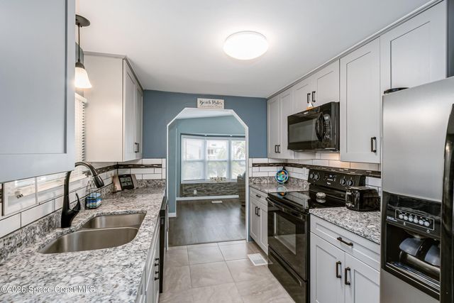 914 Hyacinth Circle, Barefoot Bay, FL 32976