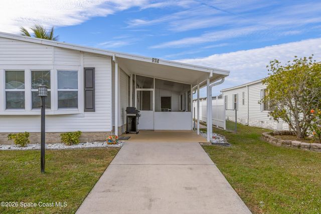 914 Hyacinth Circle, Barefoot Bay, FL 32976