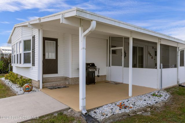 914 Hyacinth Circle, Barefoot Bay, FL 32976