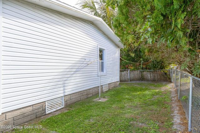 914 Hyacinth Circle, Barefoot Bay, FL 32976