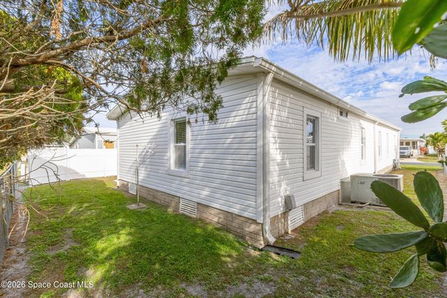 914 Hyacinth Circle, Barefoot Bay, FL 32976