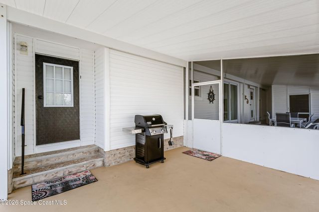 914 Hyacinth Circle, Barefoot Bay, FL 32976