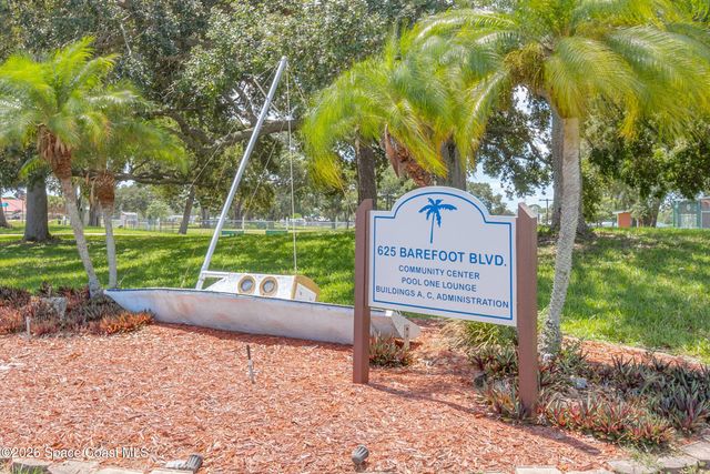 914 Hyacinth Circle, Barefoot Bay, FL 32976