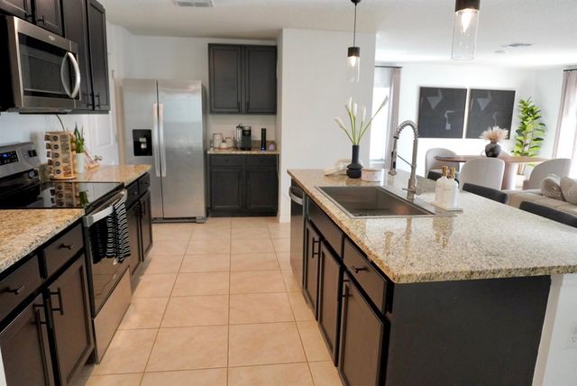 557 OLIVE CONCH STREET, Ruskin, FL 33570