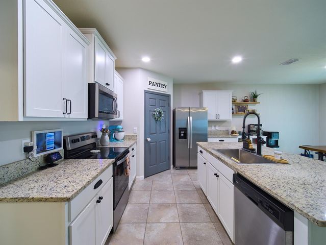 10953 SW Tessili Way, Port St. Lucie, FL 34987