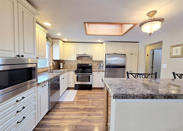 59 Holiday Park Drive, Centereach, NY 11720