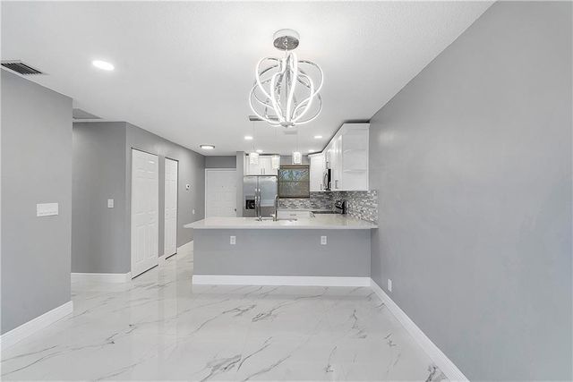 11477 NW 39TH Court 305-1, Coral Springs, FL 33065