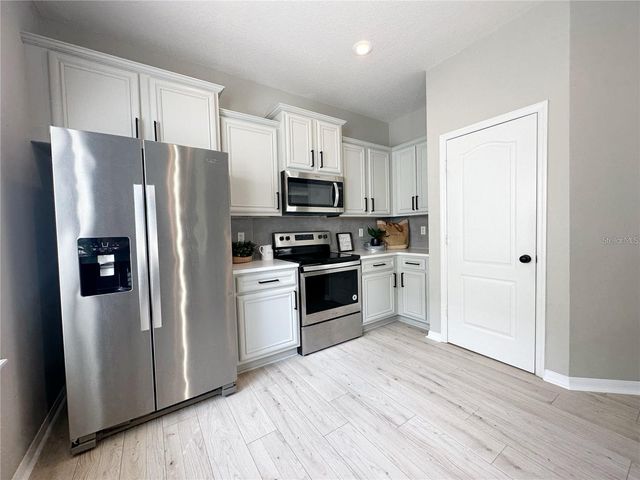 10341 LAKE DISTRICT LANE 55B, Orlando, FL 32832