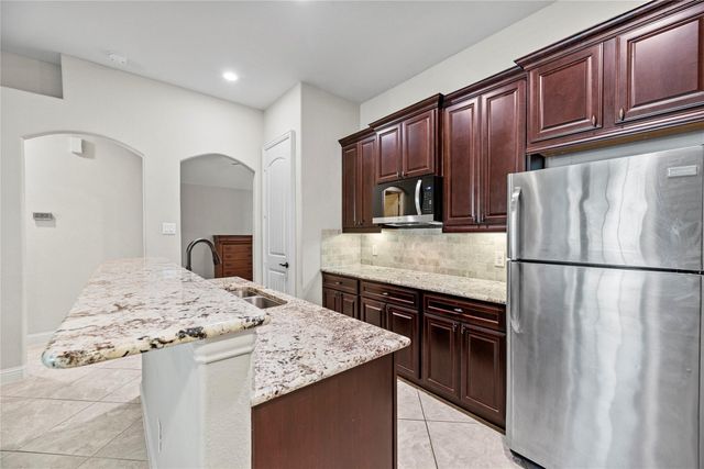 6407 Sunstone Falls Lane, Katy, TX 77493