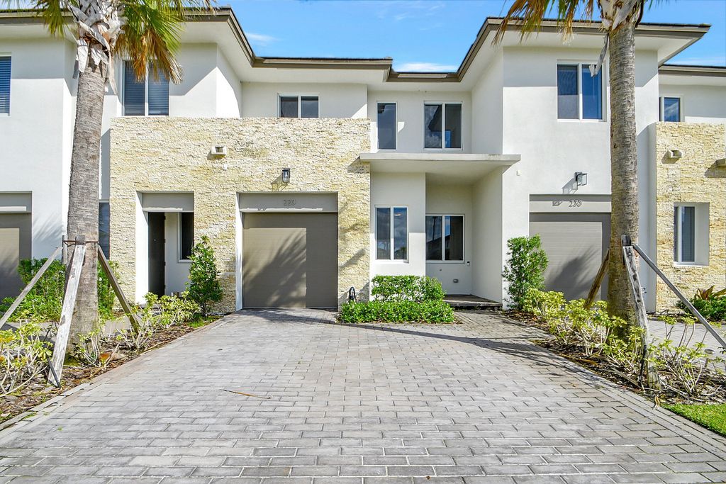 220 Pioneer Way, Royal Palm Beach, FL 33411