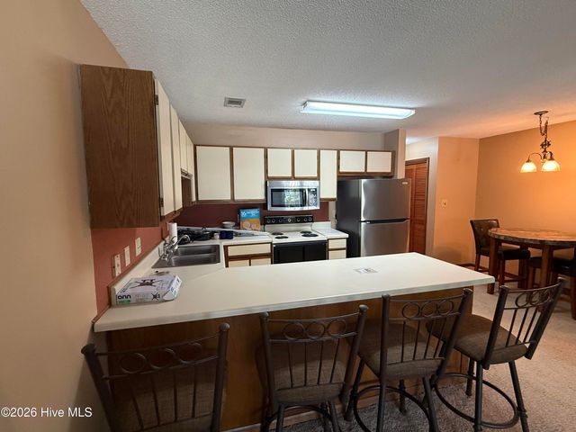 24 Boundaryline Drive NW Apt G, Calabash, NC 28467