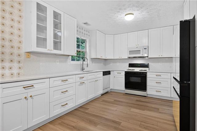 5785 Grove Place Crossing SW, Lilburn, GA 30047