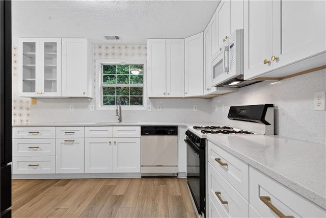 5785 Grove Place Crossing SW, Lilburn, GA 30047