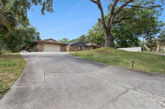 209 E CATAWBA STREET, Fruitland Park, FL 34731