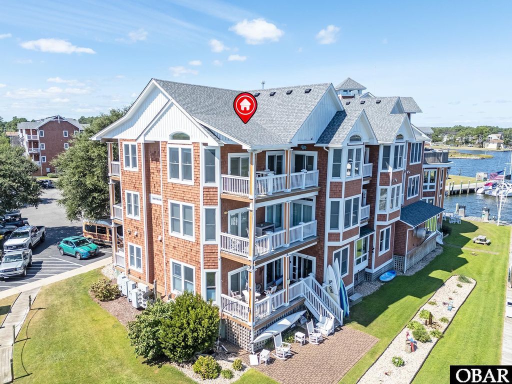 Image 1 of property listing at 1114 South Bay Club Drive, Manteo, NC 27954