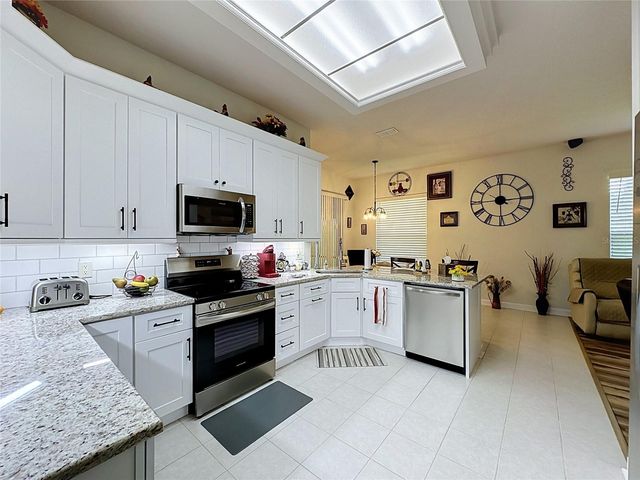 2112 SAINT IVES COURT, Clermont, FL 34711