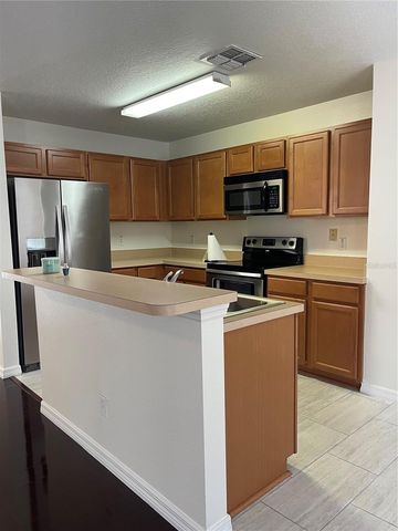636 CRESTING OAK CIRCLE 35, Orlando, FL 32824