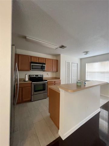 636 CRESTING OAK CIRCLE 35, Orlando, FL 32824