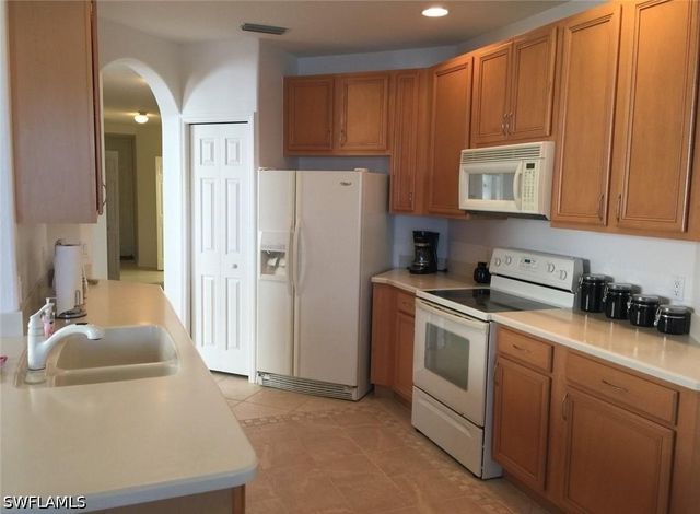 6825 Sterling Greens DR 102, Naples, FL 34104