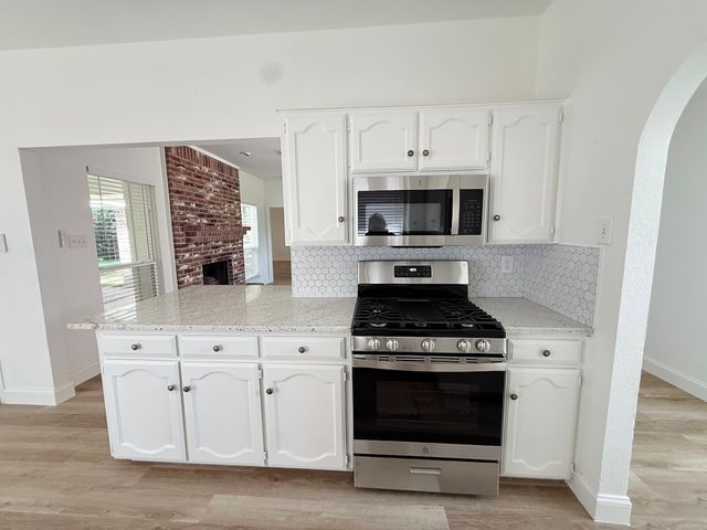 8418 Coventry Drive, Rowlett, TX 75089