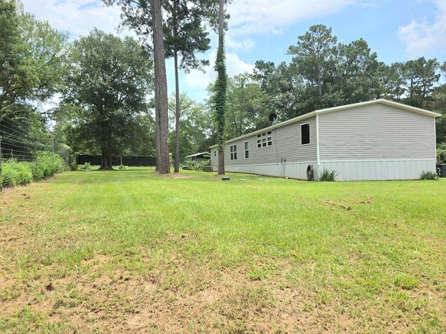 7715 Walnut Tree Lane, Plantersville, TX 77363