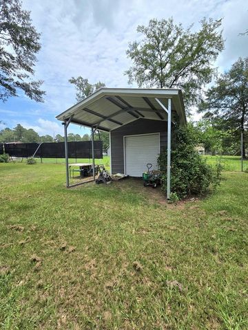 7715 Walnut Tree Lane, Plantersville, TX 77363
