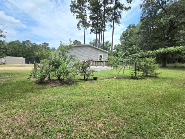 7715 Walnut Tree Lane, Plantersville, TX 77363