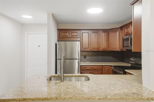 1910 SUMMER CLUB DRIVE 104, Oviedo, FL 32765