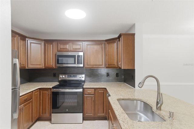 1910 SUMMER CLUB DRIVE 104, Oviedo, FL 32765