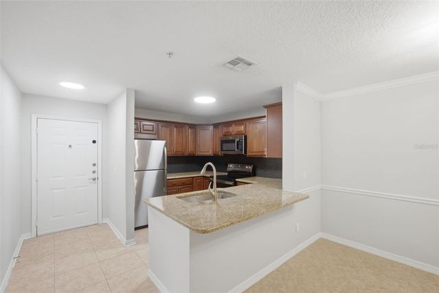 1910 SUMMER CLUB DRIVE 104, Oviedo, FL 32765