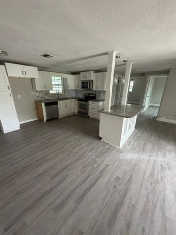 1051 MAYBURY DRIVE, Holiday, FL 34691
