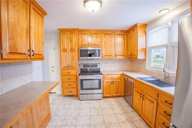 10241 Woodson Drive, Overland Park, KS 66207