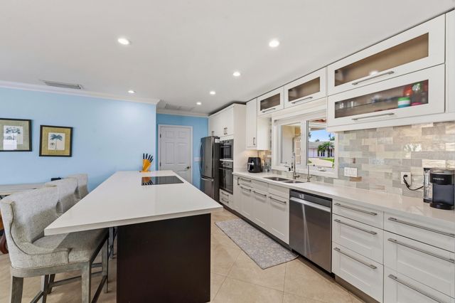 1205 Dolphin Road, Singer Island, FL 33404